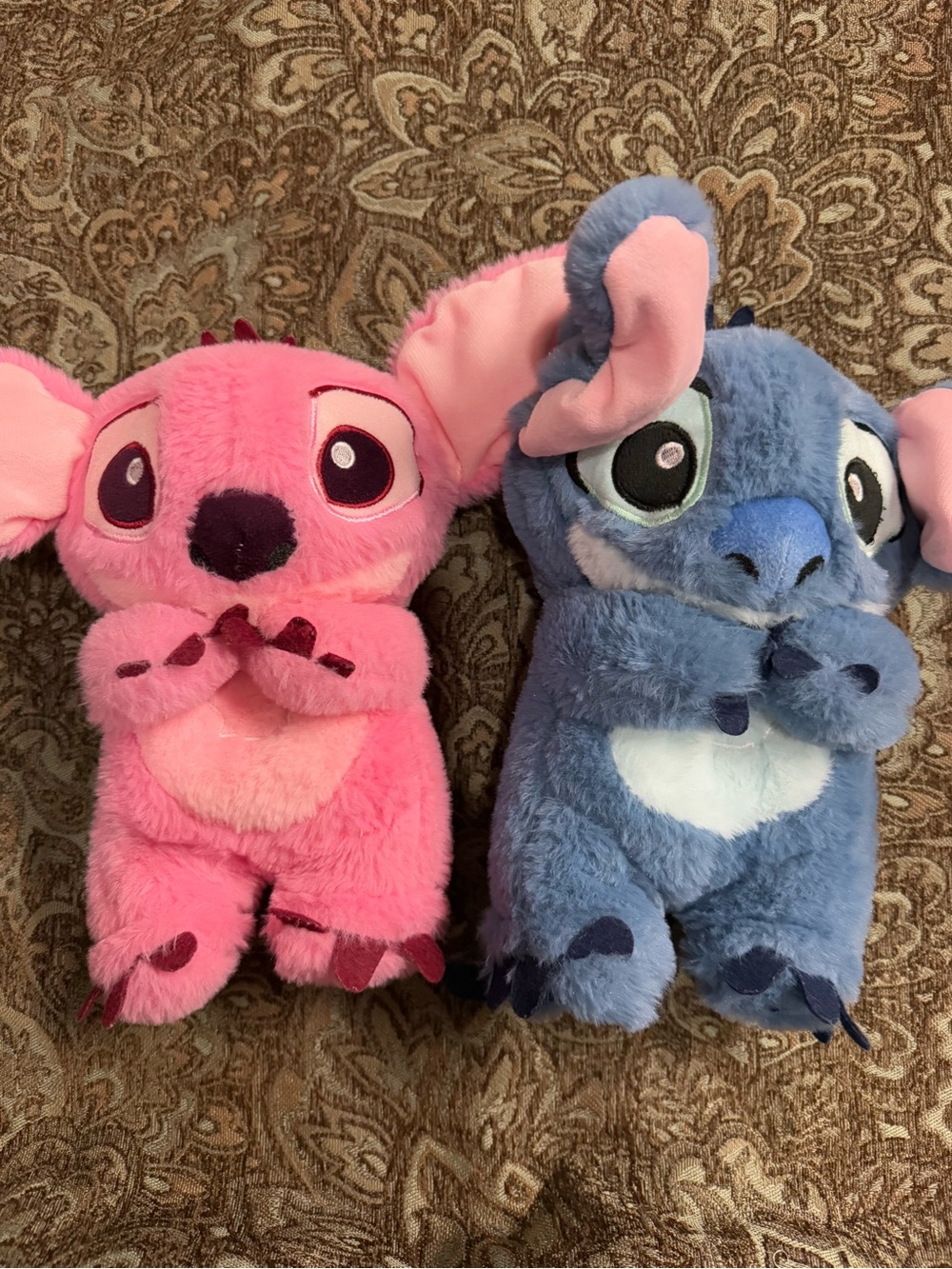 Stitch and Angel light up, breathing plushies